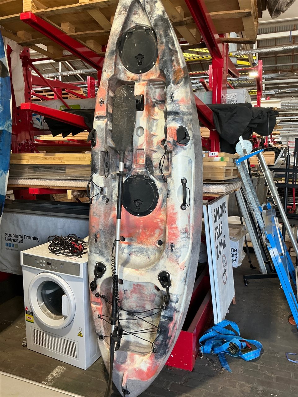Kayak with Paddle and Small Anchor with Rope