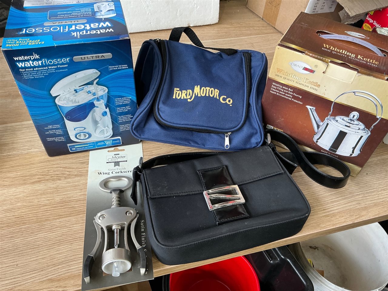 Water Floss, Whistling Kettle, Corkscrew and Toiletry Bag
