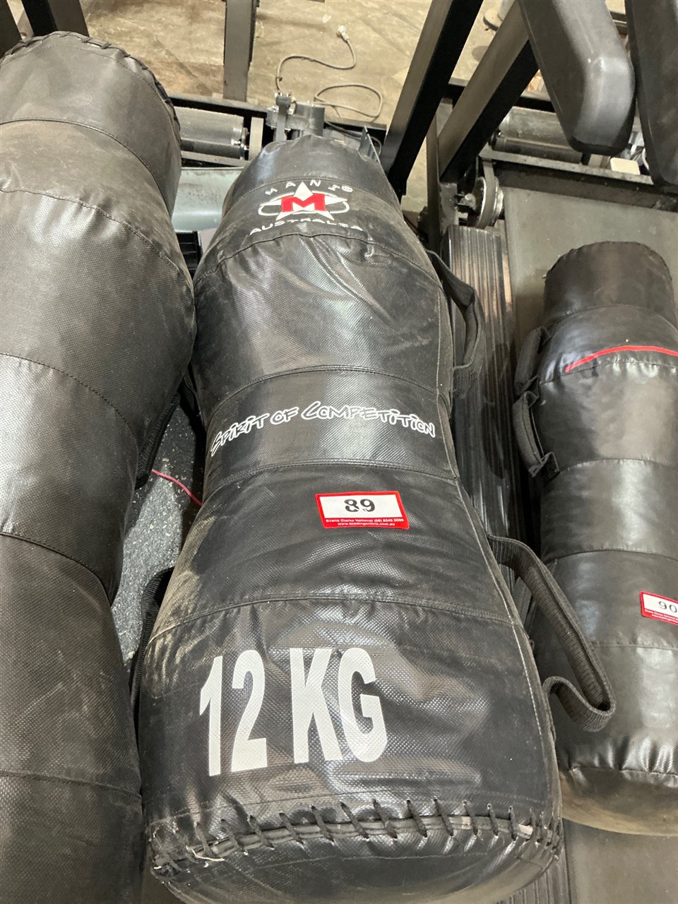 Mani Australia 12kg Punch Bag, Black Vinyl with Carry Handles