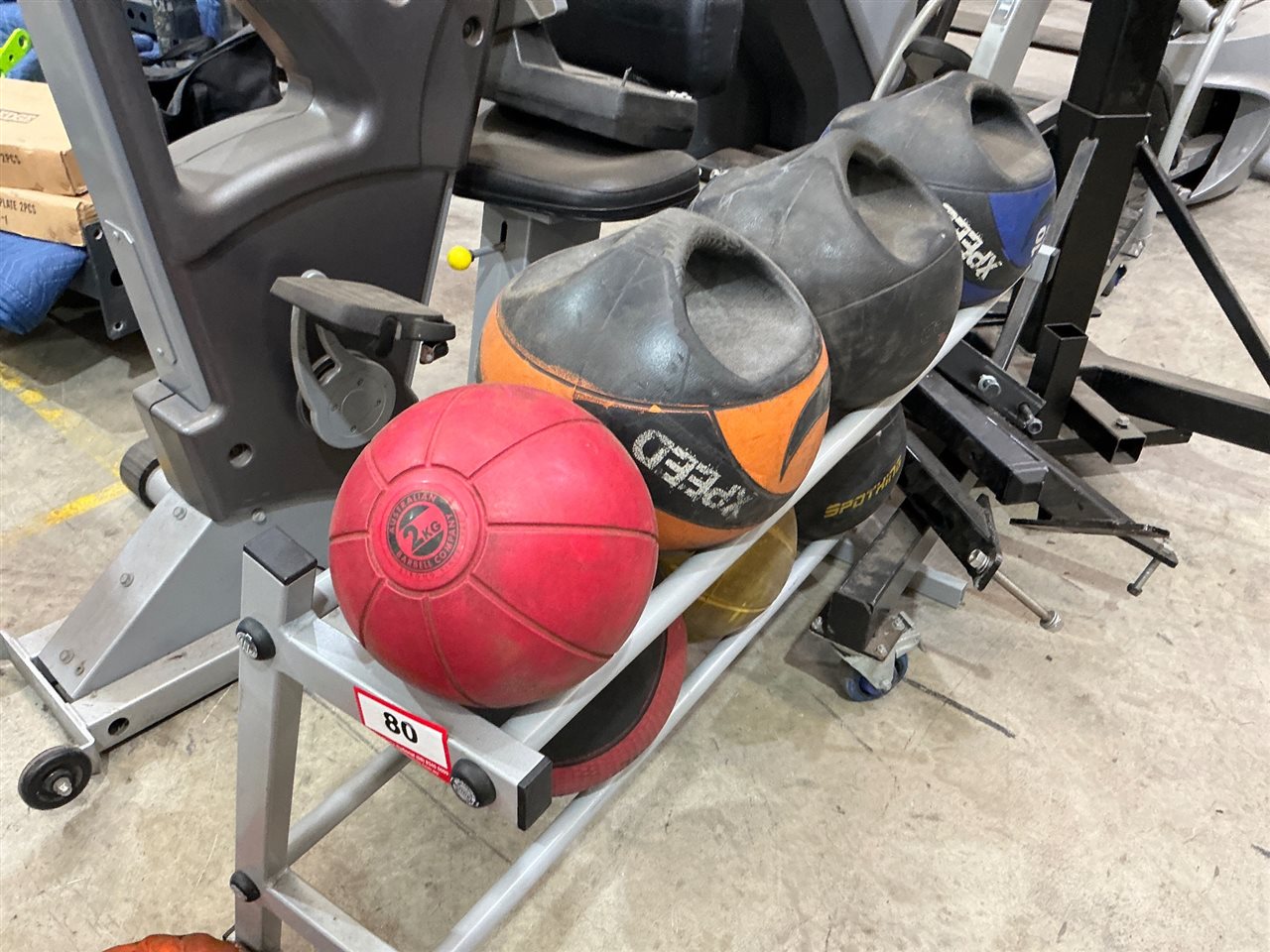 Quantity of Medicine Balls with Two-Tier Rack, Mixed Brands, Approx 8 Balls