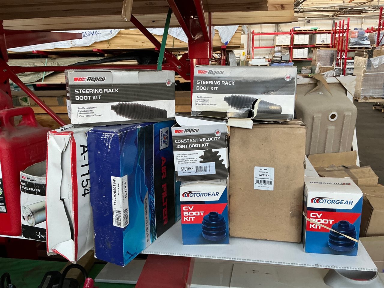 Air Filters CV Boots, Fuel Filter and Two Plastic Fuel Cans