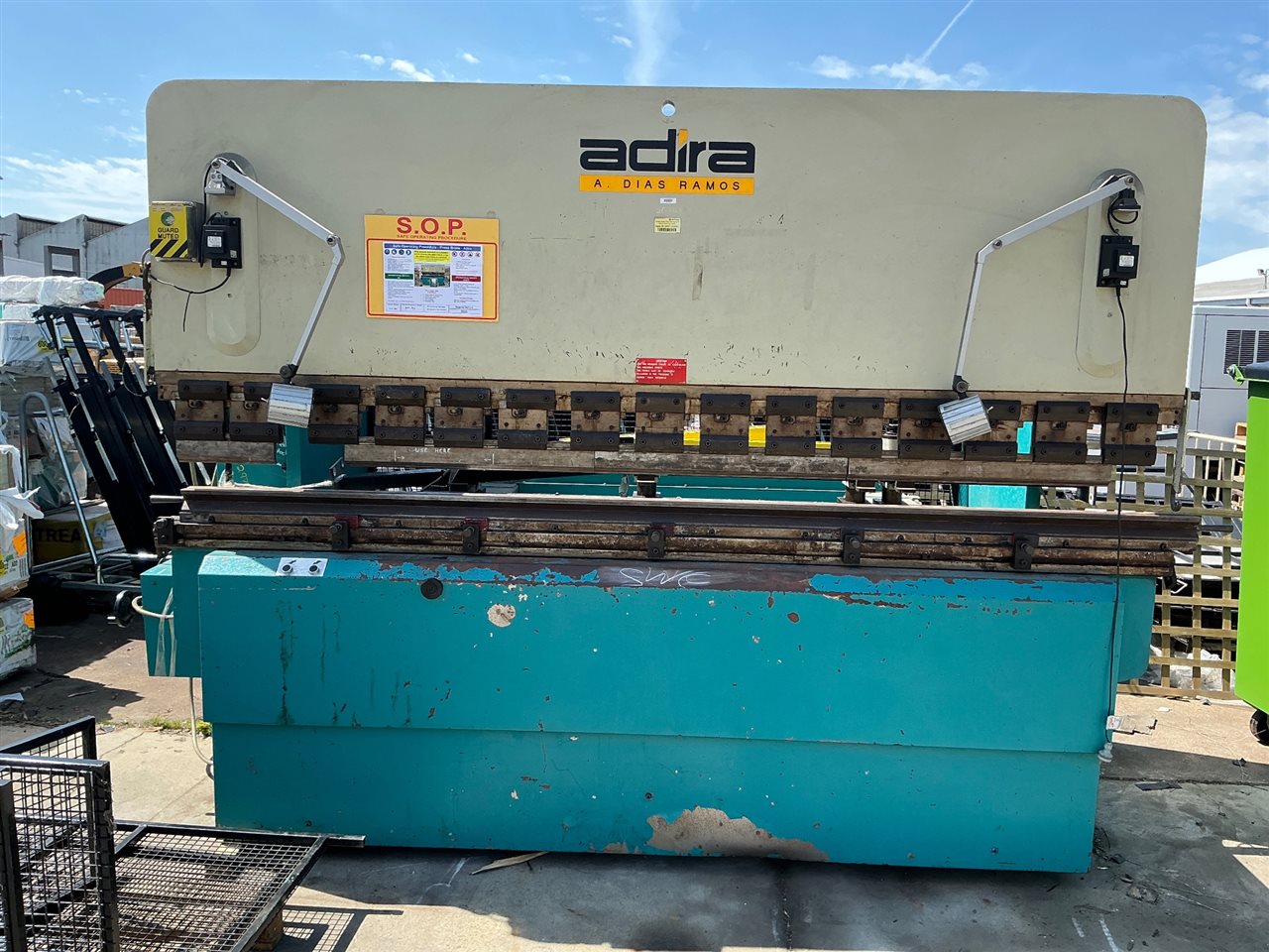 Pan Brake Press - Adira - Model Q H A -100 30 -Max Capacity 100 Ton (1000 Kn) - Max working Bending Length 3050 mm -(2540 mm Between Frames ) Max Hydraulic Pressure 30 - Stroke Miniumum 26 --Max -102 -3 Phase 415 Volt -  with Macson Red Eye 9100 Safety Unit , Steel Mesh Guarding with Tooling Accessories - Year of Manufacture 1998- ( - Buyer to Arrange Collection and Uplift with Crane to Remove )
