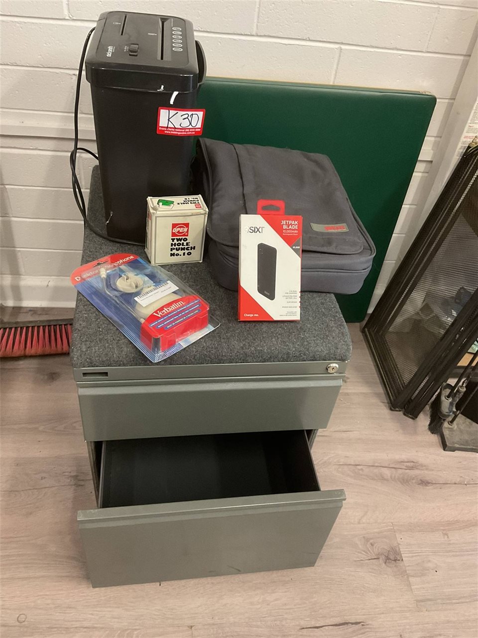 2 Drawer Filing Cabinet, Shredder, Laptop Carrier, Desktop Microphone, 2 Hole Punch And Dual Power Pack, Not Tested "Sold As Is"