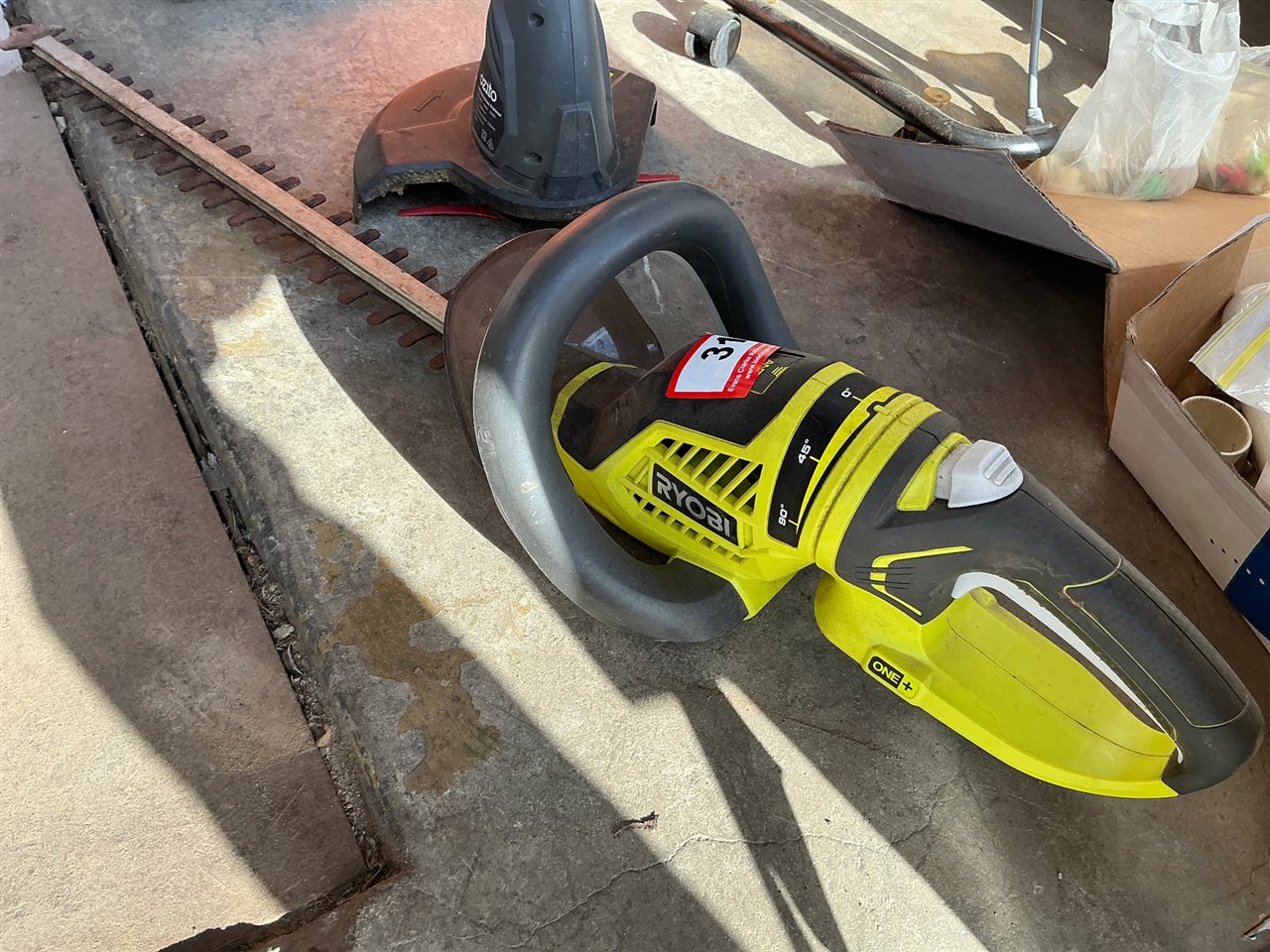 Ryobi Cordless Hedge Trimmer and Ozitio Electric Line Trimmer - Not Tested (Collect From Greenfields )