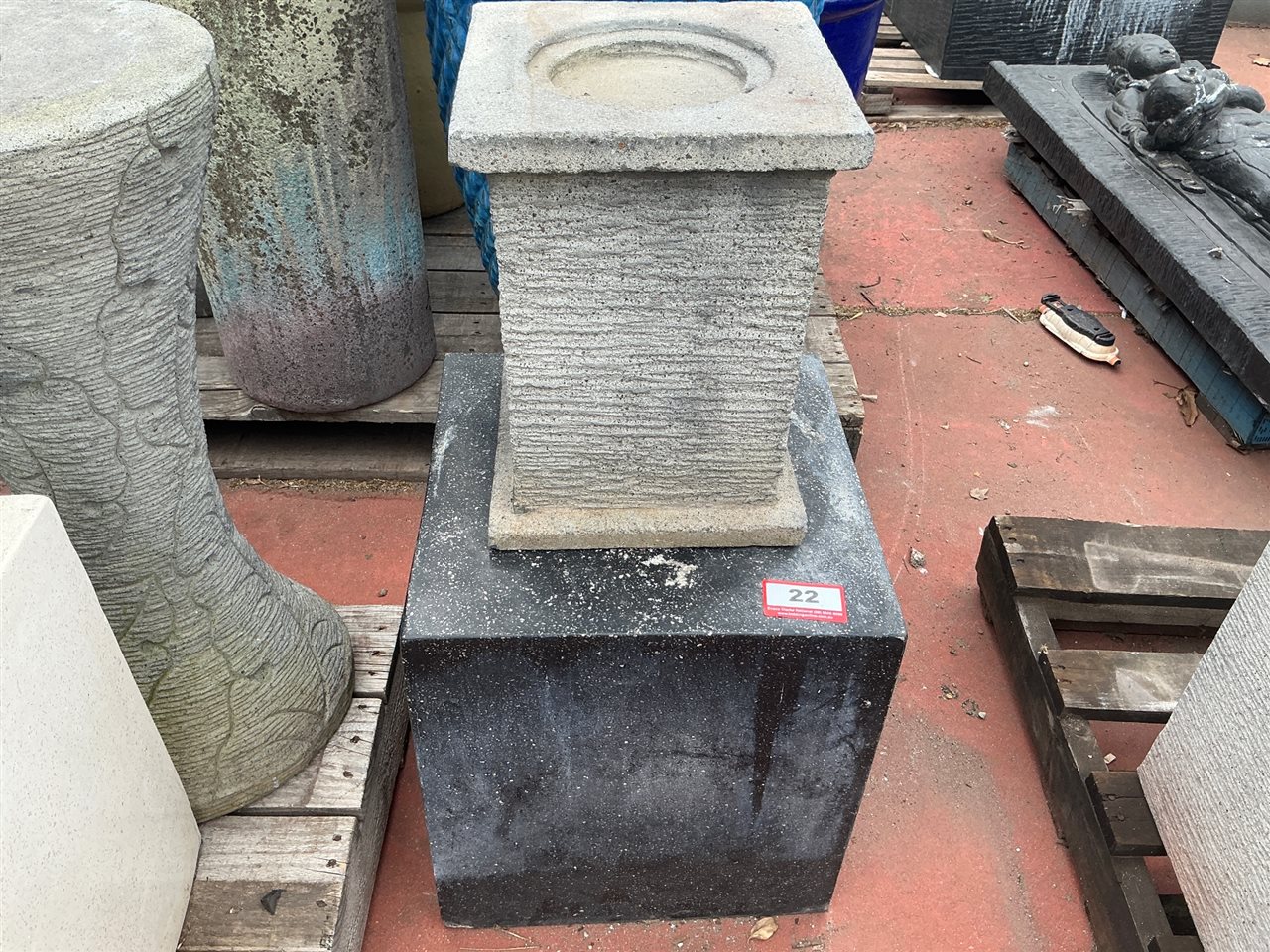 Grooved Grey Pedestal Basin on Black Speckled Cube Plinth