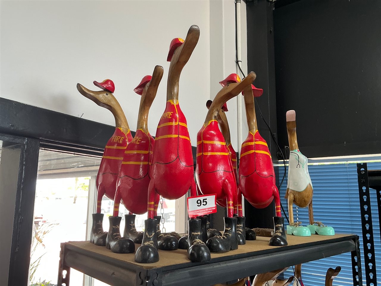 Lot of Approx 7 Carved Timber Firefighter Ducks and 1 Doctor Duck