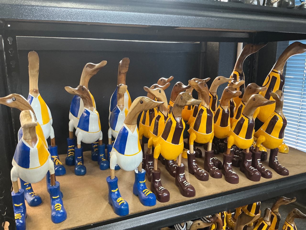 Lot of Approx 20 Carved Timber Ducks, Football Guernsey Colours