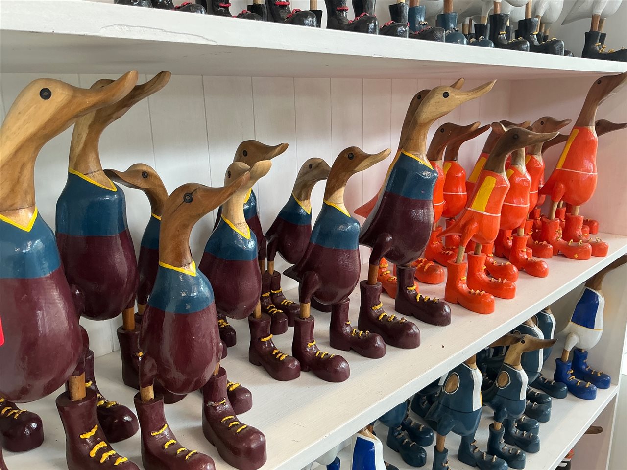 Lot of Approx 20 Carved Timber Ducks, Football Guernsey Colours