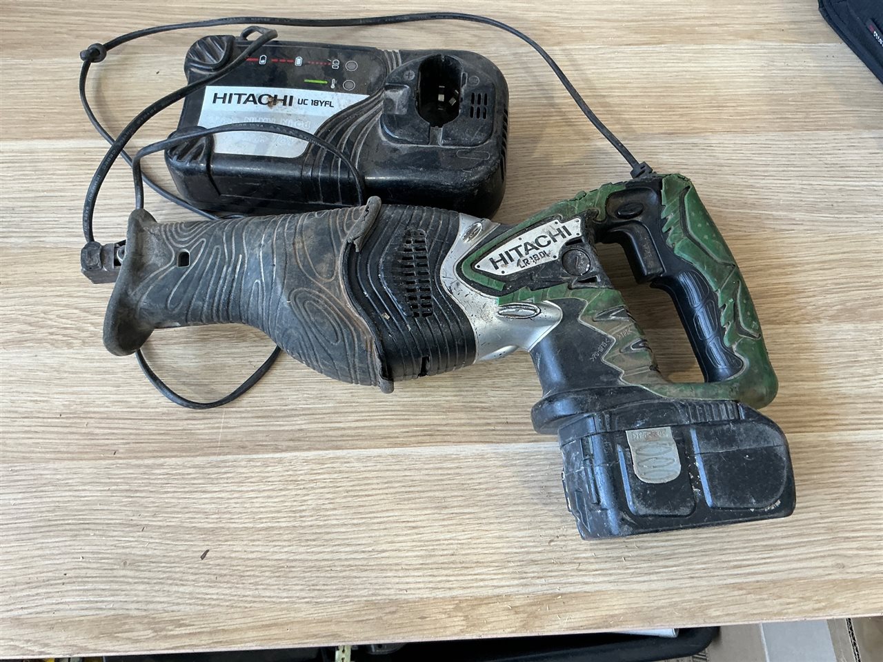 Hitachi Cordless Recip Saw-  1 Battery (Flat ) and Charger - Sold As Is