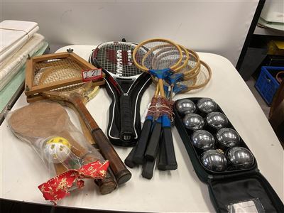 Tennis Racquets X2 Vintage, 1 New, And Shuttlecock Set, 6 Badminton Racquets And A Net And Set Of Boule Balls In A Case Thumbnail