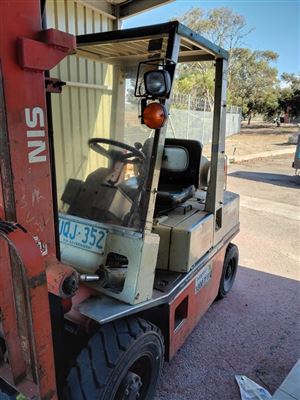 Nissan Forklift - Model A250-  Year 1987 - -LPG  -Max Height 3300 mm -Capacity 2500Kg. At Load Centre Approx 4240 Hours Showing -Previous Registration Number U Q J 352 - - Sold Unregistered -LPG Gas Bottle Not Included - Sold as Is -  Truck Weight 3715 kg.  ( Buyer to Arrange Uplift and Removal From Murray Bridge Depot ) Thumbnail