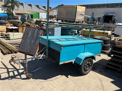 Tradie/ Painters Box Trailer -6 x 4 - with Lockable Flat Lid , Ladder Rack , with Steel Ladder . Spare Wheel - 50 mm Tow Hitch Jockey Wheel - GVM /GCM 750 - Registration YFY- 709 -Expiry 21/07/2026 Thumbnail